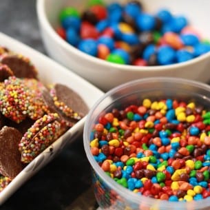 Multi-coloured chocolate lollies