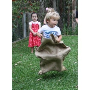How to play the hessian sack race game is one of the most favourite & classic of all kid’s party games. Play the hessian sack race as a fun outdoor relay race game.